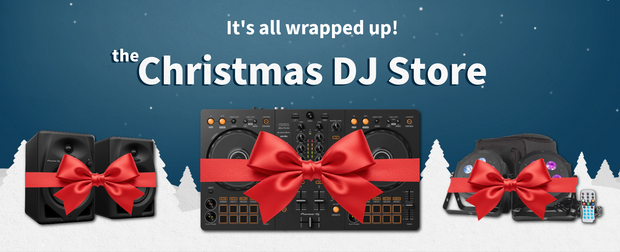 Black DJ equipment with red bows against a blue background with Christmas trees and snowflakes, promoting the 'Christmas DJ Store'.