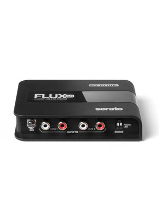 Reloop Flux Go audio interface with ground connector and source on a white background