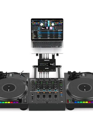 Reloop Flux DJ setup with turntables, mixer, and laptop on a white background